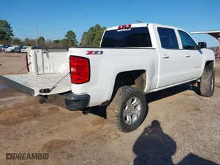 2014 Chevrolet Silverado 1500 LT with VIN 3GCUKREC3EG396527, listed as a IAAI auction lot 41477988 with NaN miles. Bid and sale history available at carsss.com. Image 4.