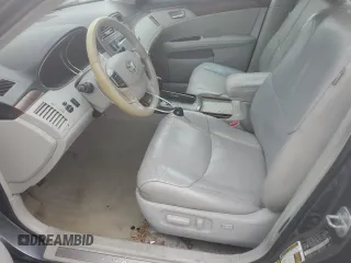 2012 Toyota Avalon z VIN 4T1BK3DB5CU445634, wystawiony jako Copart lot #56147435 z przebiegiem 173 568 mil mil oraz Szkoda całkowita • Salvage title. Historia ofert i sprzedaży dostępna na DreamBid. Obrazek 7.