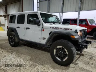 2022 Jeep Wrangler Unlimited Rubicon with VIN 1C4HJXFN8NW129717, listed as a Copart auction lot 54615745 with 33,544 mi miles and Salvage title. Bid and sale history available at DreamBid. Image 4.