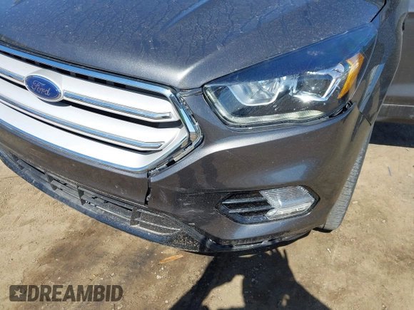 2017 Ford Escape SE with VIN 1FMCU9G94HUE80554, listed as a IAAI auction lot 42039491 with 57,145 mi miles. Bid and sale history available at carsss.com. Image 6.