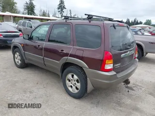 2001 Mazda Tribute LX with VIN 4F2CU08141KM10269, listed as a IAAI auction lot 42138704 with 166,825 mi miles and . Bid and sale history available at carsss.com. Image 3.