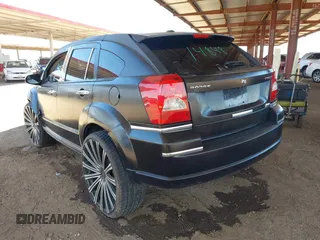 2010 Dodge Caliber SXT z VIN 1B3CB4HA3AD612829, wystawiony jako IAAI lot #42303635 z przebiegiem 230 191 mil mil oraz . Historia ofert i sprzedaży dostępna na DreamBid. Obrazek 3.