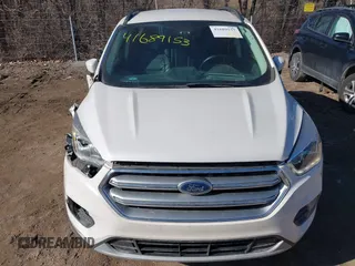 2017 Ford Escape SE z VIN 1FMCU9GD6HUB41900, wystawiony jako IAAI lot #41689153 z przebiegiem 85 975 mil mil oraz . Historia ofert i sprzedaży dostępna na DreamBid. Obrazek 17.