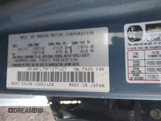 2015 Mazda 3 i Touring with VIN JM1BM1L79F1271427, listed as a IAAI auction lot 42586262 with Not provided miles and . Bid and sale history available at DreamBid. Image 9.