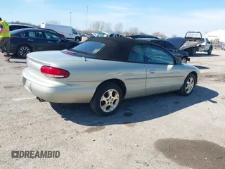 1999 Chrysler Sebring JXi z VIN 3C3EL55H6XT603058, wystawiony jako IAAI lot #41774322 z przebiegiem 157 852 mil mil oraz . Historia ofert i sprzedaży dostępna na DreamBid. Obrazek 4.