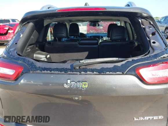 2016 Jeep Cherokee Limited with VIN 1C4PJLDS7GW159825, listed as a IAAI auction lot 41951609 with 102,624 mi miles and . Bid and sale history available at DreamBid. Image 18.