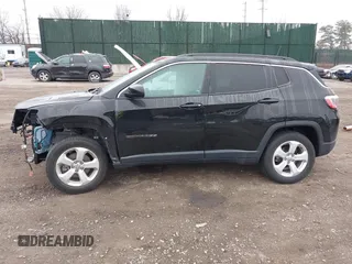 2019 Jeep Compass Latitude with VIN 3C4NJDBB3KT689174, listed as a IAAI auction lot 41843137 with 56,722 mi miles. Bid and sale history available at carsss.com. Image 14.