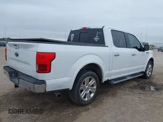 2019 Ford F-150 XL with VIN 1FTEW1C50KFB57819, listed as a IAAI auction lot 41627136 with 64,558 mi miles and . Bid and sale history available at DreamBid. Image 4.
