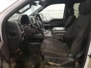 2020 Ford F-150 XL with VIN 1FTFW1E49LFC33659, listed as a Copart auction lot 52859575 with 104,623 mi miles and Salvage Title. Bid and sale history available at carsss.com. Image 7.