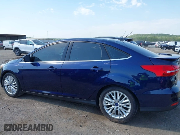 2017 Ford Focus Titanium with VIN 1FADP3J29HL204892, listed as a IAAI auction lot 42032705 with 119,028 mi miles and . Bid and sale history available at DreamBid. Image 15.