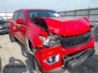 2020 Chevrolet Colorado 4WD LT with VIN 1GCGTCEN8L1106478, listed as a IAAI auction lot 42060373 with 68,753 mi miles and . Bid and sale history available at DreamBid. Image 1.