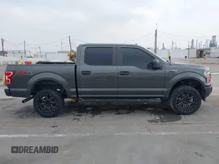 2018 Ford F-150 XL with VIN 1FTEW1EP4JKD45070, listed as a IAAI auction lot 42648874 with 140,424 mi miles and . Bid and sale history available at DreamBid. Image 14.