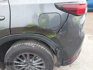 2021 Mazda CX-5 Touring with VIN JM3KFACM6M0480487, listed as a IAAI auction lot 41731646 with 26,951 mi miles and . Bid and sale history available at carsss.com. Image 6.