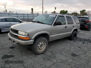 2004 Chevrolet Blazer LS z VIN 1GNDT13X34K148670, wystawiony jako Copart lot #44439845 z przebiegiem 196 344 mil mil oraz Czysty tytuł • Clean title. Historia ofert i sprzedaży dostępna na DreamBid. Obrazek 1.