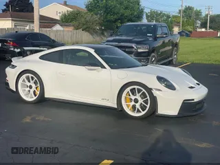 2022 Porsche 911 GT3 z VIN WP0AC2A96NS269734, wystawiony jako IAAI lot #42551639 z przebiegiem 10 179 mil mil oraz . Historia ofert i sprzedaży dostępna na DreamBid. Obrazek 1.