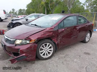 2012 Honda Civic Sdn EX-L with VIN 19XFB2F93CE066804, listed as a IAAI auction lot 41869172 with 59,700 mi miles. Bid and sale history available at carsss.com. Image 2.