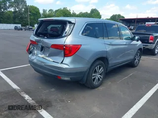 2018 Honda Pilot EX-L with VIN 5FNYF5H56JB003955, listed as a IAAI auction lot 42732433 with 116,613 mi miles and . Bid and sale history available at DreamBid. Image 4.