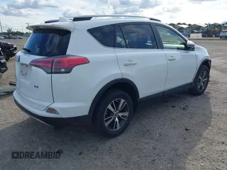 2018 Toyota RAV4 XLE with VIN JTMWFREV7JJ174483, listed as a IAAI auction lot 41597797 with 82,836 mi miles. Bid and sale history available at carsss.com. Image 4.