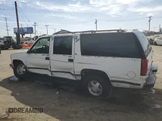 1997 Chevrolet Suburban with VIN 1GNEC16R5VJ301591, listed as a Copart auction lot 75965054 with 213,321 mi miles and Salvage Title. Bid and sale history available at carsss.com. Image 2.