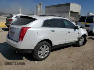 2014 Cadillac SRX with VIN 3GYFNAE32ES667019, listed as a Copart auction lot 49008165 with 98,995 mi miles and Salvage Title. Bid and sale history available at DreamBid. Image 3.