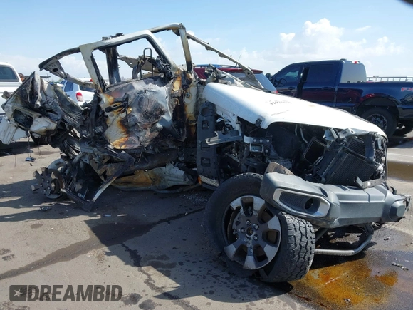 2018 Jeep Wrangler Unlimited Sahara with VIN 1C4HJXEG9JW215826, listed as a IAAI auction lot 41935595 with Not provided miles and . Bid and sale history available at DreamBid. Image 1.