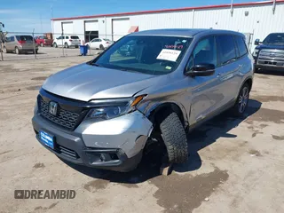 2021 Honda Passport EX-L with VIN 5FNYF8H51MB024752, listed as a IAAI auction lot 41858129 with 77,545 mi miles and . Bid and sale history available at carsss.com. Image 2.