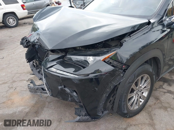 2020 Lexus NX 300 with VIN JTJAARBZ2L5010681, listed as a IAAI auction lot 42032321 with 73,599 mi miles and . Bid and sale history available at DreamBid. Image 6.