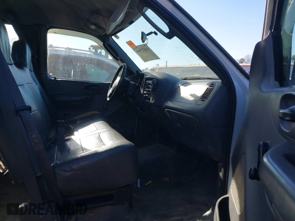 2003 Ford F-150 XL with VIN 1FTRX17W33NA66469, listed as a IAAI auction lot 41677909 with 236,619 mi miles. Bid and sale history available at carsss.com. Image 5.