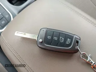 2019 Hyundai Santa Fe SE z VIN 5NMS2CADXKH005960, wystawiony jako IAAI lot #42341142 z przebiegiem 71 617 mil mil oraz . Historia ofert i sprzedaży dostępna na DreamBid. Obrazek 11.