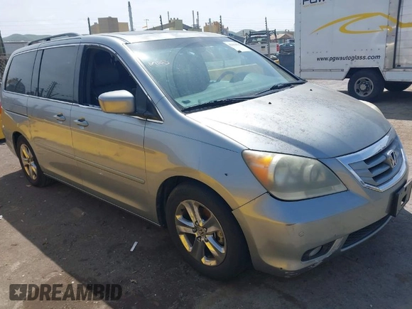 2010 Honda Odyssey Touring с VIN 5FNRL3H90AB038351, выставлен на аукционе IAAI как лот 42036500 с пробегом 176 304 миль миль и . История ставок и продаж доступна на DreamBid. Изображение 1.
