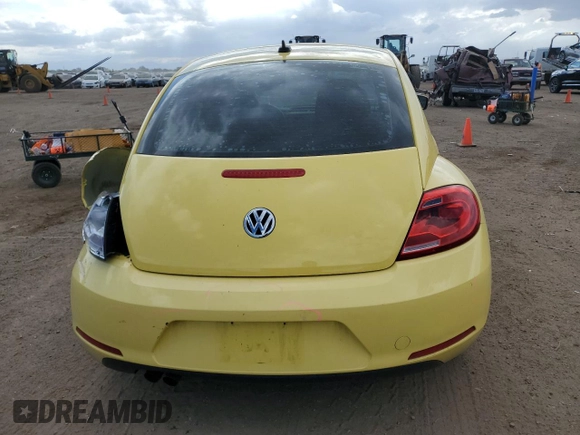 2014 Volkswagen Beetle with VIN 3VWHX7AT6EM632938, listed as a Copart auction lot 58599124 with 89,546 mi miles and Salvage Title. Bid and sale history available at DreamBid. Image 6.