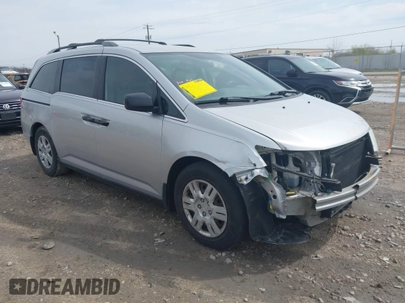 2013 Honda Odyssey LX with VIN 5FNRL5H22DB086503, listed as a IAAI auction lot 42133471 with 223,200 mi miles and . Bid and sale history available at carsss.com. Image 1.