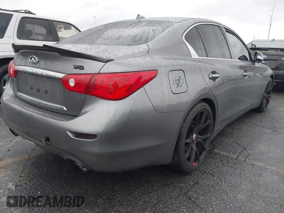 2014 Infiniti Q50 with VIN JN1BV7AP5EM688434, listed as a IAAI auction lot 41548512 with 110,846 mi miles. Bid and sale history available at carsss.com. Image 4.