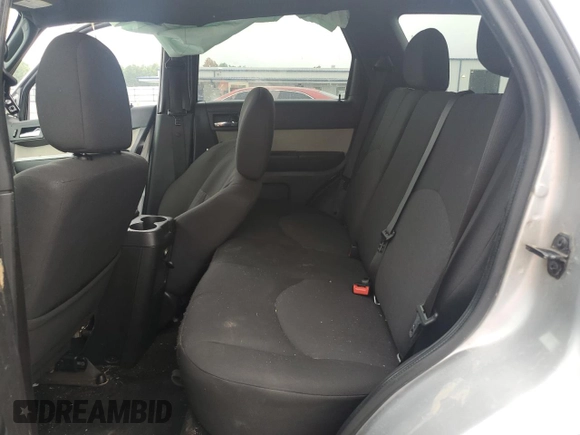 2010 Mercury Mariner with VIN 4M2CN8B7XAKJ30875, listed as a Copart auction lot 59964305 with 117,799 mi miles and Salvage title. Bid and sale history available at DreamBid. Image 11.