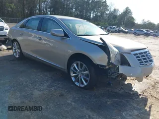 2013 Cadillac XTS Luxury with VIN 2G61P5S39D9172708, listed as a IAAI auction lot 41781371 with 100,173 mi miles. Bid and sale history available at carsss.com. Image 1.