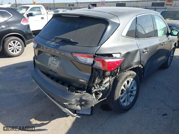 2020 Ford Escape SE with VIN 1FMCU9G63LUA52750, listed as a IAAI auction lot 40952482 with 81,070 mi miles. Bid and sale history available at carsss.com. Image 6.