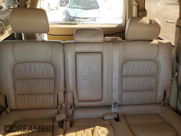 2000 Lexus LX 470 z VIN JT6HT00W7Y0114787, wystawiony jako Copart lot #84433924 z przebiegiem Nie podano mil oraz Szkoda całkowita • Salvage title. Historia ofert i sprzedaży dostępna na DreamBid. Obrazek 10.