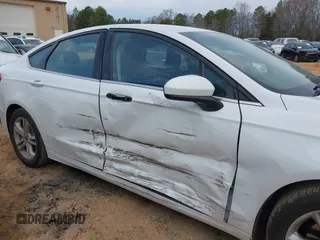 2018 Ford Fusion SE with VIN 3FA6P0HD7JR229022, listed as a IAAI auction lot 41758924 with 121,598 mi miles. Bid and sale history available at carsss.com. Image 6.
