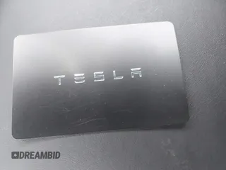 2018 Tesla Model 3 Long Range Battery z VIN 5YJ3E1EB7JF070600, wystawiony jako IAAI lot #42324240 z przebiegiem 68 804 mil mil oraz . Historia ofert i sprzedaży dostępna na DreamBid. Obrazek 11.