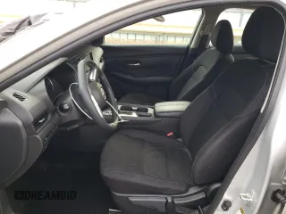 2023 Nissan Sentra S with VIN 3N1AB8BV0PY298963, listed as a Copart auction lot 52571885 with 25,309 mi miles and Salvage Title. Bid and sale history available at DreamBid. Image 7.