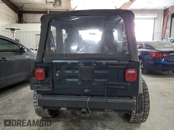 2006 Jeep Wrangler SE with VIN 1J4FA29S36P724699, listed as a Copart auction lot 41764425 with 129,016 mi miles and Salvage Title. Bid and sale history available at carsss.com. Image 6.