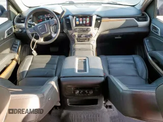 2020 GMC Yukon Denali with VIN 1GKS2CKJ4LR144035, listed as a Copart auction lot 52163455 with 67,944 mi miles and Salvage Title. Bid and sale history available at carsss.com. Image 8.