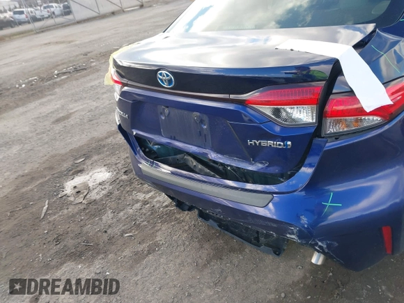 2021 Toyota Corolla Hybrid LE with VIN JTDEAMDE9MJ021431, listed as a IAAI auction lot 41747142 with 165,680 mi miles. Bid and sale history available at carsss.com. Image 6.