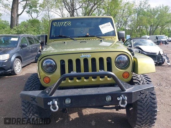2008 Jeep Wrangler Unlimited Sahara with VIN 1J4GA59148L545255, listed as a IAAI auction lot 42177758 with 155,953 mi miles and . Bid and sale history available at DreamBid. Image 13.