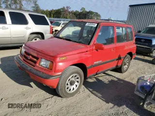 1998 Suzuki Sidekick JS z VIN 2S3TE02V3W6406072, wystawiony jako Copart lot #75855544 z przebiegiem 120 359 mil mil oraz Szkody całkowita. Historia ofert i sprzedaży dostępna na DreamBid. Obrazek 1.