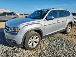 2018 Volkswagen Atlas SE with VIN 1V2CR2CA1JC527059, listed as a Copart auction lot 62957875 with 140,337 mi miles and Salvage title. Bid and sale history available at DreamBid. Image 1.