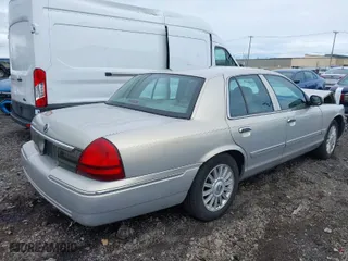 2008 Mercury Grand Marquis LS with VIN 2MEHM75VX8X636053, listed as a IAAI auction lot 41972021 with 66,221 mi miles. Bid and sale history available at carsss.com. Image 4.
