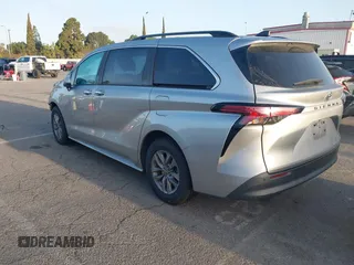 2021 Toyota Sienna XLE with VIN 5TDYRKEC2MS074448, listed as a IAAI auction lot 41946030 with 122,509 mi miles and . Bid and sale history available at DreamBid. Image 3.