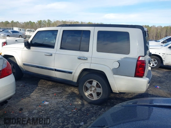 2010 Jeep Commander Sport with VIN 1J4RH4GK1AC122505, listed as a IAAI auction lot 41222229 with 244,001 mi miles and . Bid and sale history available at DreamBid. Image 3.