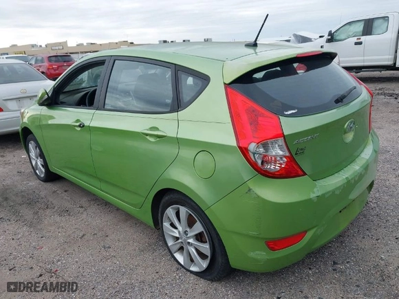 2013 Hyundai Accent SE with VIN KMHCU5AEXDU069586, listed as a IAAI auction lot 40968974 with 98,939 mi miles. Bid and sale history available at carsss.com. Image 3.